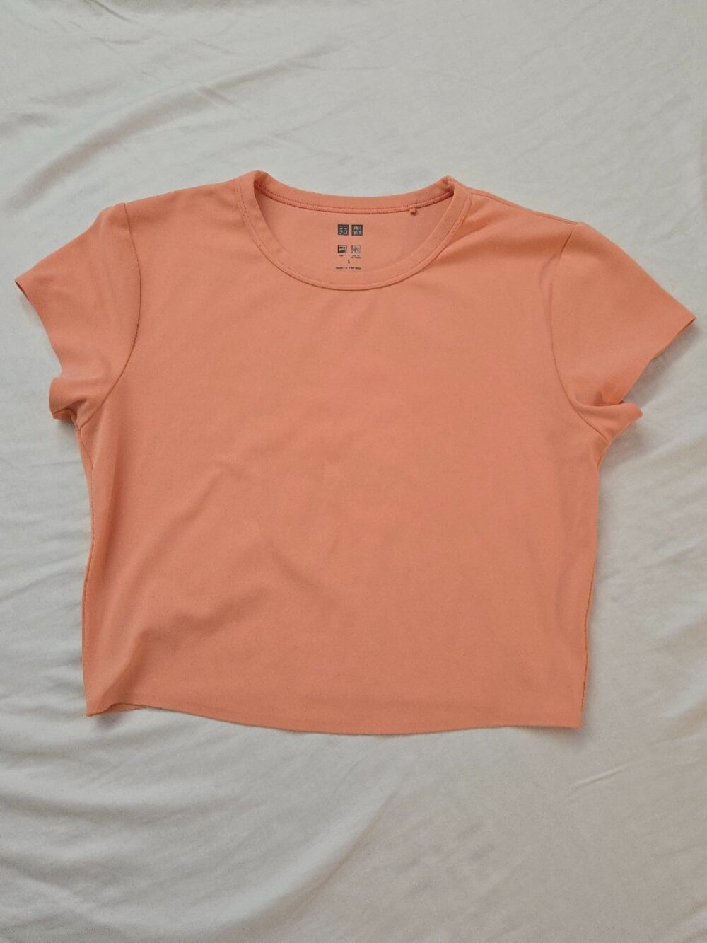 UNIQLO Orange cropped top